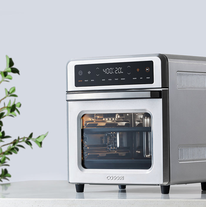 COSORI 13-Quart Air Fryer Oven with tray installed inside cooking chamber