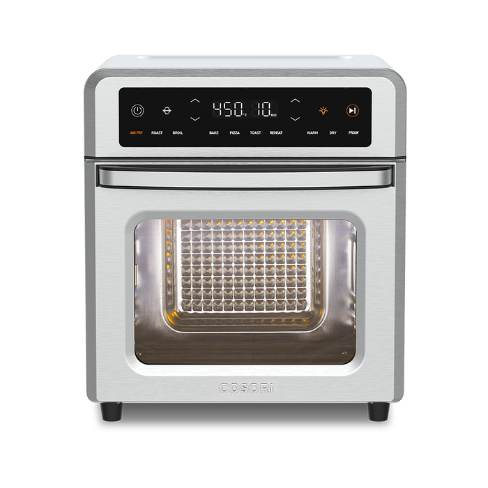 Front straight-on view of the Cosori 13-Quart Air Fryer Oven with the glass door closed and interior empty.