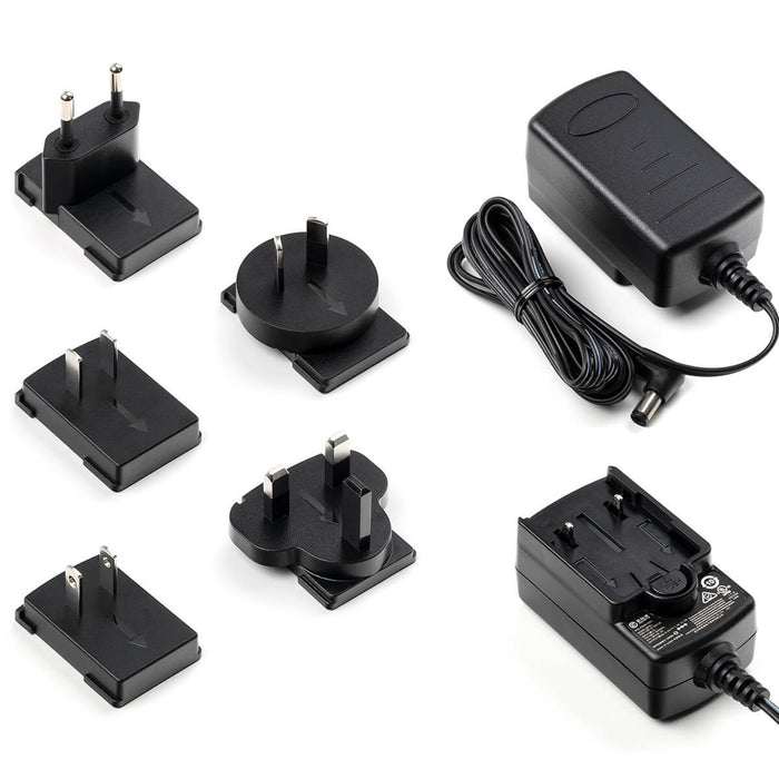 Alimentation 9V DC 1.3A, 100-240V, livrée avec cinq fiches interchangeables (EU/US/UK/CN/AU)