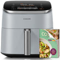 COSORI TurboBlaze 6-quart air fryer in light gray with recipe booklet